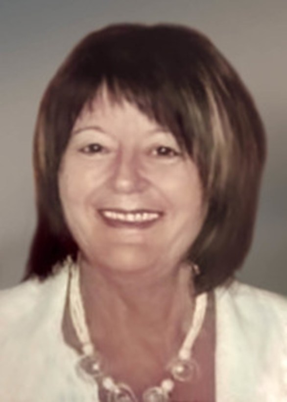 Mme Denise Huard